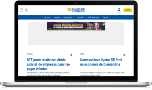 Site Diário do Comércio no laptop